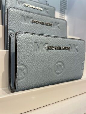 Michael Kors Jet Set Travel Md MK Logo Debossed Bifold Wallet
Pale Ocean 
NWT
